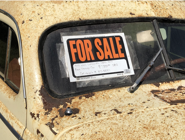 car with for sale sign