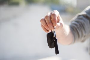 how to sell my car privately person holding car keys